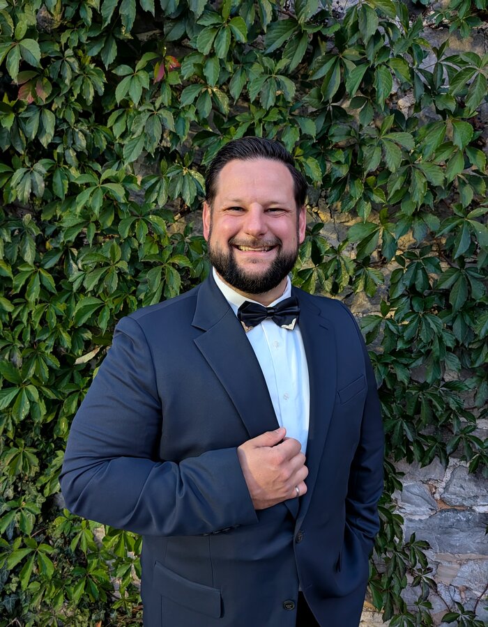 Jacob Eastman dressed up with fun party energy